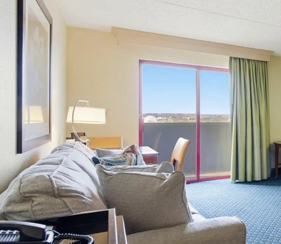 Hotel suite living area with a Table Rock Lake area view near Thunder Ridge Nature Arena in Branson