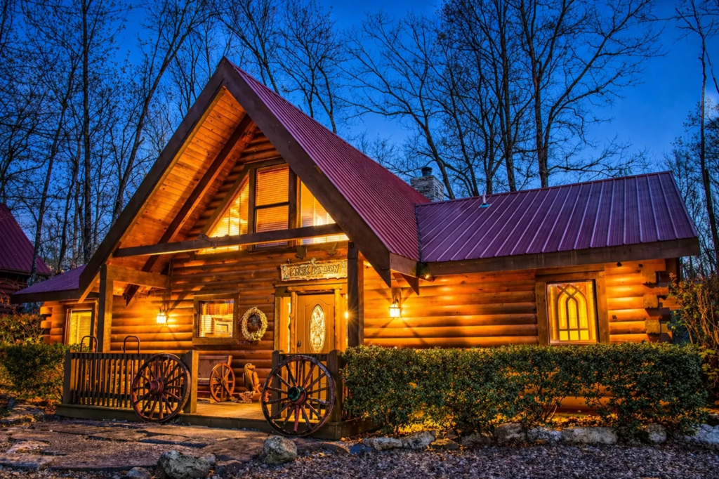 Branson Cedars log cabin exterior at dusk